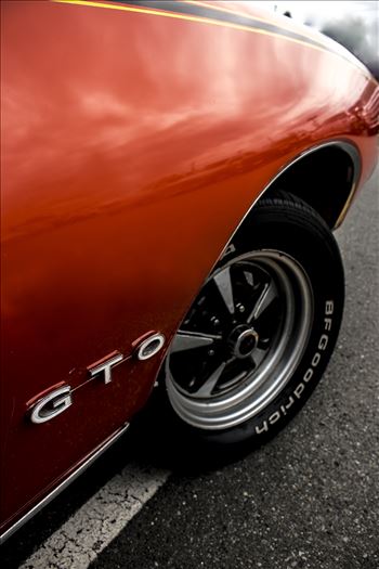 1969 Pontiac GTO Judge 
This is a gorgeous car totally unrestored original. Classic.